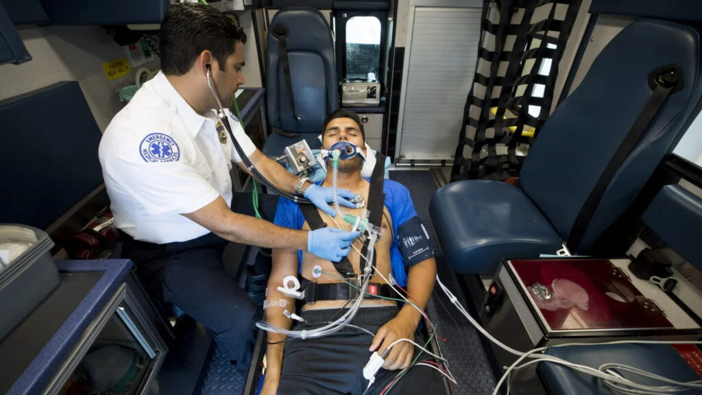 “Ambulance procurement team reviewing patient compartment and technical specifications”